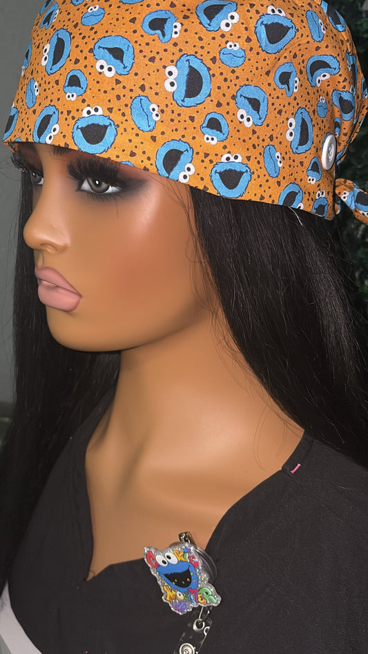 Orange Cookie Monster Scrub Cap + Badge Reel Set